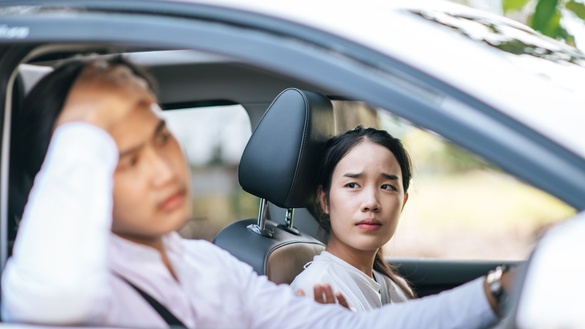 Anxious driver driving and looking panick in the car